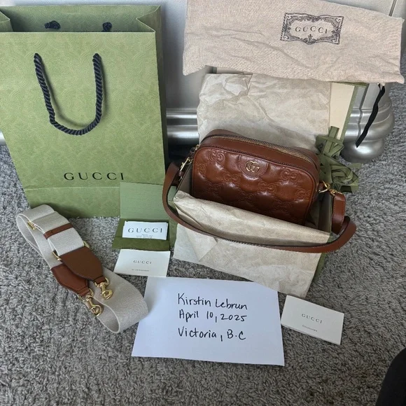 Gucci - Picture 1 of 2